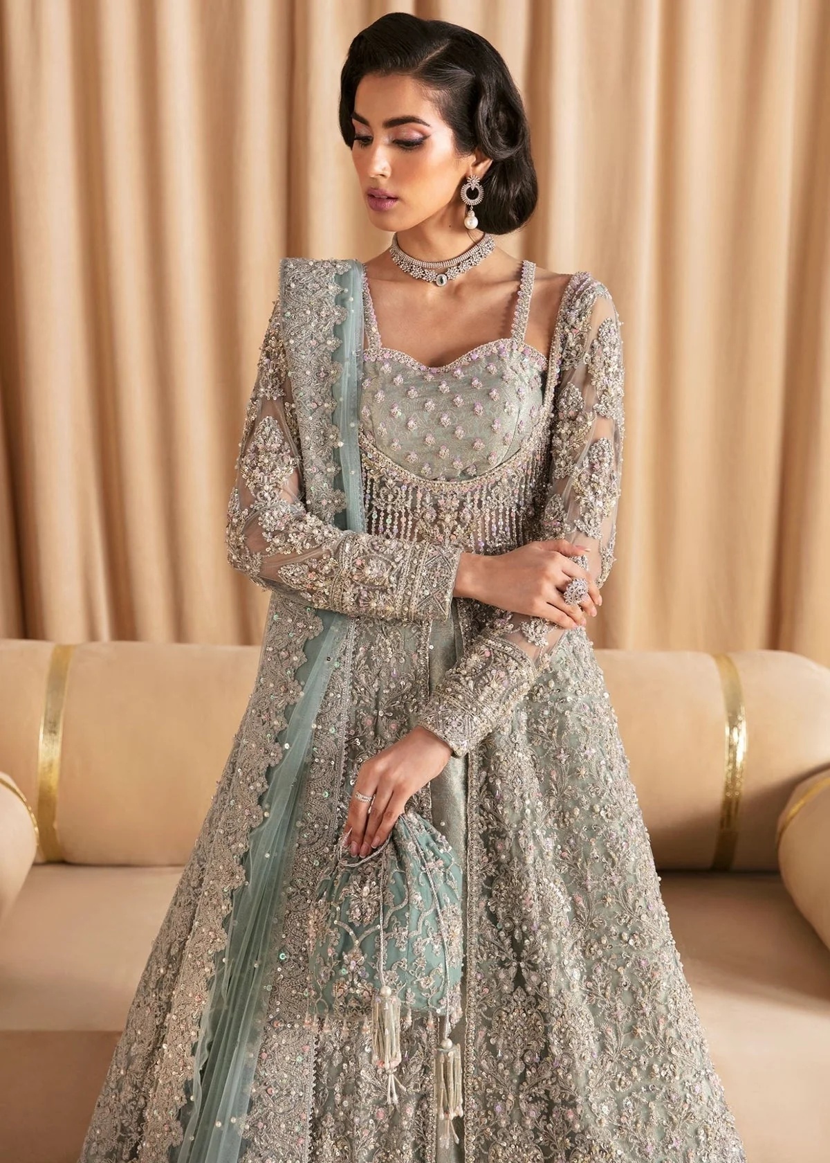 RIJA I KANWAL MALIK clothing in blue tones.